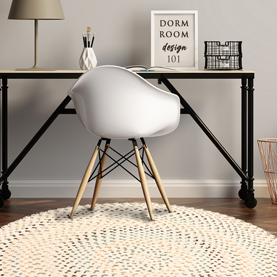 dorm room with round braided rug
