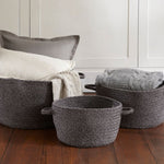 Heathered Grey Braided Rug Basket Roomshot image