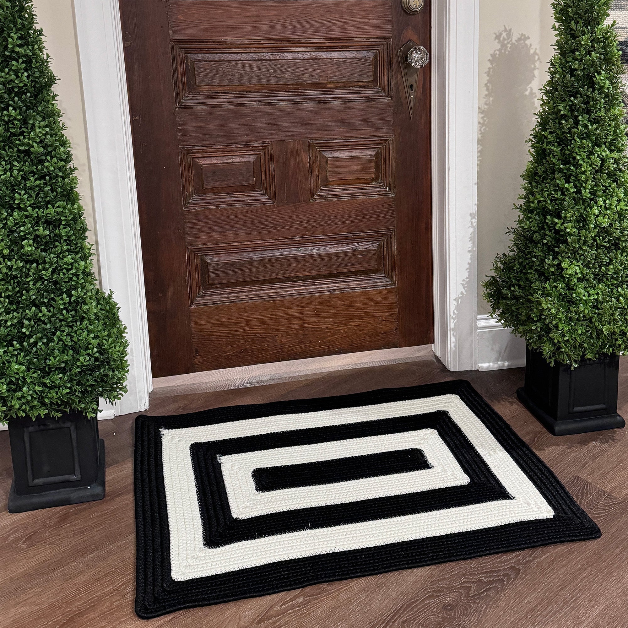 Timeless Black Braided Rug Concentric Rectangle image