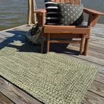 Dockside Palm Leaf Braided Rug Concentric Roomshot image