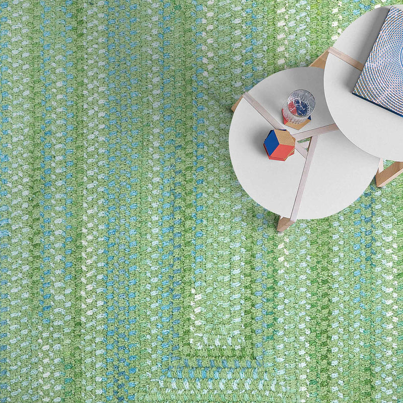 Sailor Boy Sea Monster Green Braided Rug Concentric Roomshot image