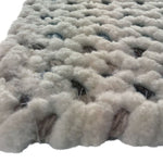 Dramatic Static Cyber White Braided Rug Cross-Sewn Cross Section image