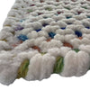 Dramatic Static Carnival Braided Rug Cross-Sewn Cross Section image