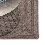 Simplicity Wood Braided Rug Oval Roomshot image